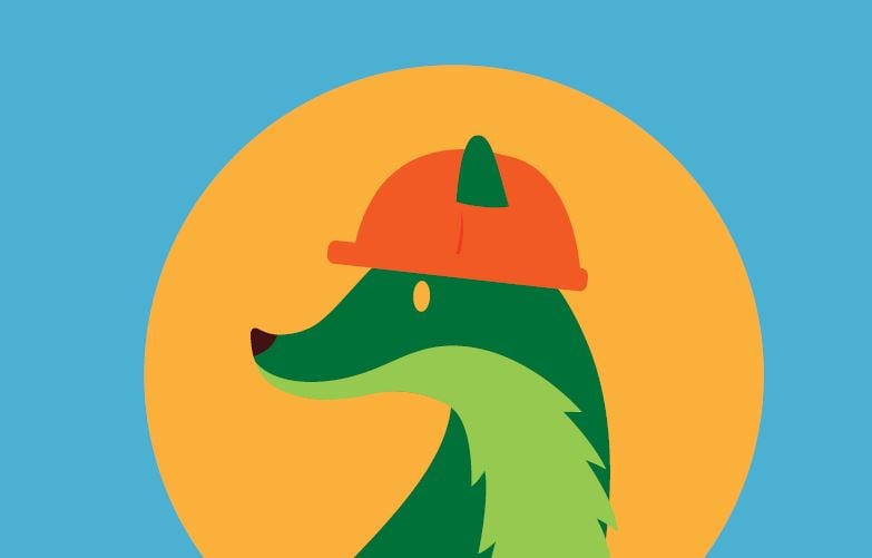 The greenfox fox mascot wearing a hard hat for solar panel improvements.